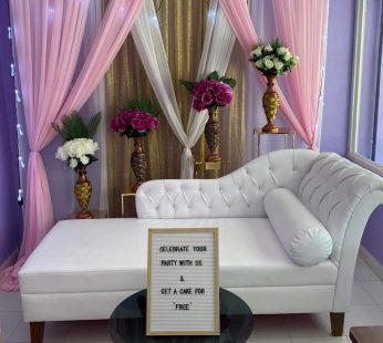 Simple Decoration with flower, curtain, lights and sofa